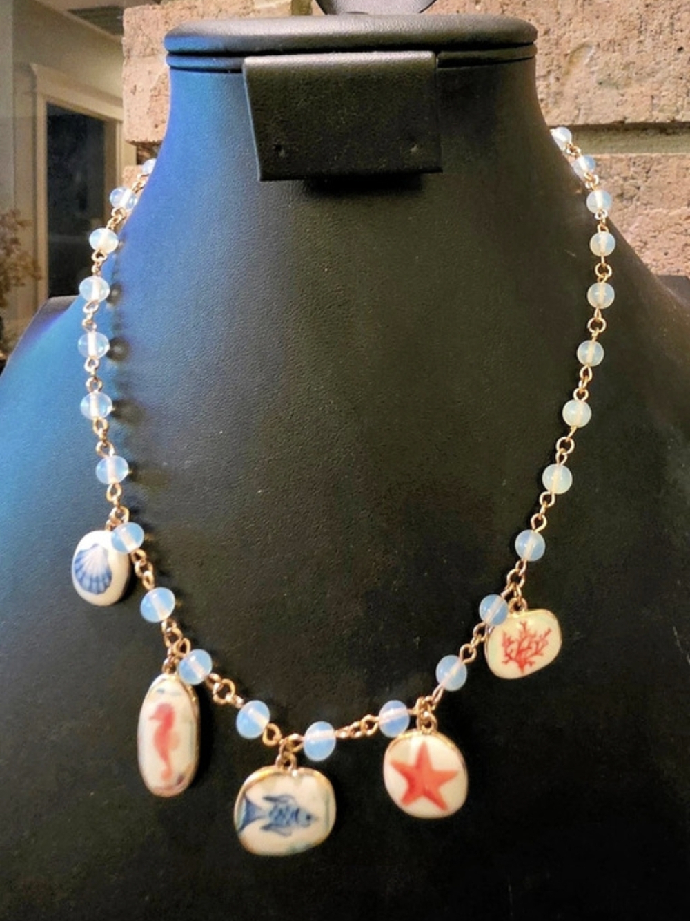 Sealife Charm Necklace With Moonstone 19" Gold-Tone